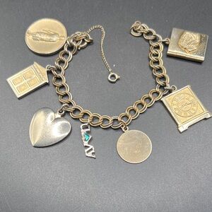 Avon 1965 Awards charm bracelet